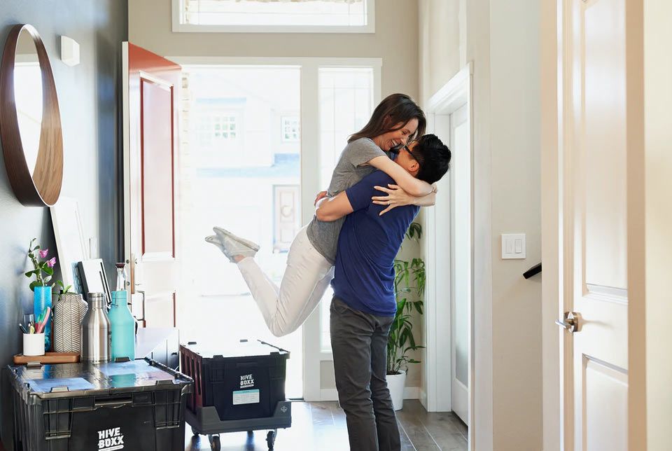 Couple celebrating a new chapter at home